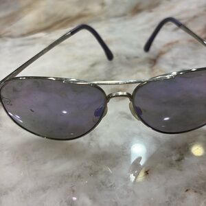 No scratches.  Definitely worn. Chanel authentic pilot sunglasses.